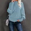 Stylish light blue cable knit sweater featuring elegant lantern sleeves for winter - Blue
