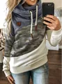 Detail of women's cowl neck hoodie with color-block camouflage and drawstring design. - S / Tops / Camouflage + Blue