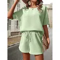 Completo donna due pezzi in maglia a nido d'ape con top a pipistrello e pantaloncini verde menta - Verde matcha