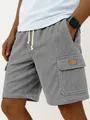 Close-up detail showing the ribbed corduroy texture and cargo pocket of gray men's shorts - S / Bottoms / Gray