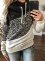 Close-up of women's cowl neck sweatshirt with leopard print and color block design - S / Tops / Leopard + Black