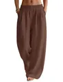 Close-up detail of brown linen wide-leg pants featuring elastic waist and pockets - L-140 / Bottoms / Brown