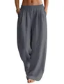 Close-up of grey flowy linen wide-leg pants featuring a comfortable elastic waist. - Dark Gray