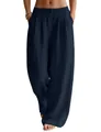 Detailed view of navy blue linen wide-leg pants featuring elastic waist and side pockets - Navy Blue