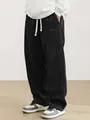 Pantaloni da uomo in velluto a coste nero con coulisse e patch del logo - Nero