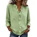 Dettaglio di una camicia da donna in cotone e lino verde con volant e scollo a V - Taglia S / Top / Verde erba