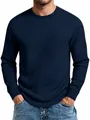 Vue rapprochée montrant la texture gaufrée bleu marine de ce haut cintré pour homme - Bleu marine
