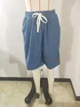 Vista frontal de pantalones cortos de hombre de punto gofrado azul con cordón blanco - 3XL / Bottoms / Azul