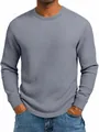 Close-up detail of grey waffle knit fabric on a men's long-sleeved casual shirt - S / Tops / Gray
