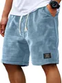Detailed close-up view of light blue men's waffle knit casual shorts with drawstring - 3XL / Bottoms / Light Blue