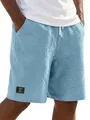 Dettaglio ravvicinato pantaloncini casual uomo in cotone e lino celeste con trama tessuto - Taglia M / Pantaloni e gonne / Azzurro
