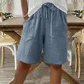 Women's casual blue cotton linen shorts with comfortable drawstring waist and pockets. - Light Blue