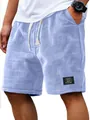 Macro detail of light blue men's waffle knit casual shorts with breathable texture. - 3XL / Bottoms / Sky Blue