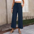 Close-up detail of navy blue high-waisted cotton linen wide leg pants with a drawstring - Navy Blue