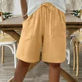 Summer yellow cotton linen casual shorts with drawstring waist and front pockets for women. - Turmeric