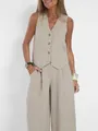 Vista detallada de un elegante conjunto de chaleco de lino beige y pantalones anchos - M / Top y Pantalones / Albaricoque