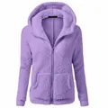 Detailed shot of a purple fuzzy hooded jacket featuring front zipper and cozy fleece texture - 3XL / Tops / Purple
