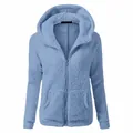 Detail of the soft sherpa texture on this light blue hooded jacket with a metal zipper. - S / Tops / Blue