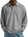 Detalle de polo gris de punto gofrado que muestra el tejido texturizado y cuello - S / Tops / Gris