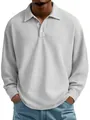 Detailed view showing the waffle knit texture of a light grey men's long-sleeve polo shirt - White