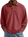 Detailed view of the texture on a men's red waffle knit long-sleeved polo shirt - Red