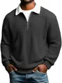Close-up of men's waffle texture polo shirt with contrast collar and zipper detail. - S / Tops / Black