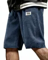 Men's navy blue casual shorts with textured jacquard lattice pattern and side pockets. - Navy Blue