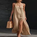 Elegante beige maxi-jurk met V-hals, spaghettibandjes en een zijsplit detail - S / Tops / Abrikoos
