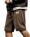 Detailed view of men's brown jacquard waffle knit shorts showing fabric texture - Dark Brown