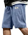Detailed macro view of blue jacquard textured fabric on men's summer sports shorts - S / Bottoms / Blue