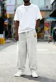 Loose fit men's corduroy straight pants with drawstring waist in light grey finish - White