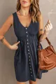 Detail shot of a navy blue sleeveless dress with button-front and elastic waist - S / Bottoms / Grey Blue