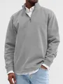 Detailed view of grey quarter-zip stand collar sweatshirt for men in a layered look. - M / Tops / Light Gray