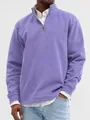 Detail view of a men's purple half-zip pullover sweatshirt featuring a stand collar design - Purple