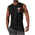 Close-up detail of a men's black muscle tank top featuring a tropical palm tree print - S / Tops / Black