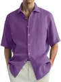 Detail view of the washed cotton texture on a casual purple short-sleeved men's shirt. - M / Tops / Purple