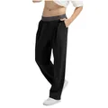 Detailed view showing the texture and fit of men's black casual knit pants with grey waist - S / Bottoms / Black