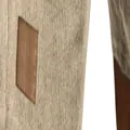 Close-up detail of vertical fine-striped fabric and brown patch on men's drawstring shorts. - S / Bottoms / Khaki