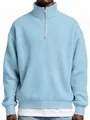 Detailed view of the light blue waffle-knit texture on a men's quarter-zip sweatshirt. - Sky Blue