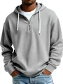 Detailed view of a grey ribbed men's hoodie with a functional quarter-zip closure. - S / Tops / Gray