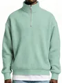 Close-up detail of a men's mint green waffle knit quarter-zip pullover sweatshirt - Light Green