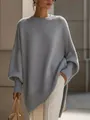 Dettaglio moda di un maglione grigio oversize in maglia con girocollo e polsini a coste - XS / Grigio