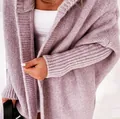Detailed view of a cozy lavender knit cardigan featuring relaxed batwing sleeves and texture. - S / Tops / Purple