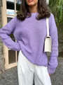 Detail view of a cozy purple knitted sweater with a stylish round neck and loose fit - S / Tops / Lavender