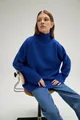 Close-up detail of a cozy cobalt blue oversized turtleneck knit sweater for women - S / Tops / Sapphire Blue
