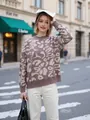 Detailed view of women's leopard print knit sweater in a stylish street setting - One Size / Tops / Red Brown