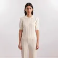 Women's cream short-sleeved polo neck knit sweater featuring elegant textured vertical patterns - S / Tops / White