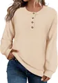 Close-up detail of women's cream Henley neck waffle knit sweater with decorative buttons - S / Tops / Apricot