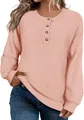 Close-up showing the waffle knit texture and button details of a pink women's sweater - S / Tops / Pink