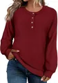 Macro view of wine red waffle knit sweater showing round neck and wooden buttons - S / Tops / Burgundy